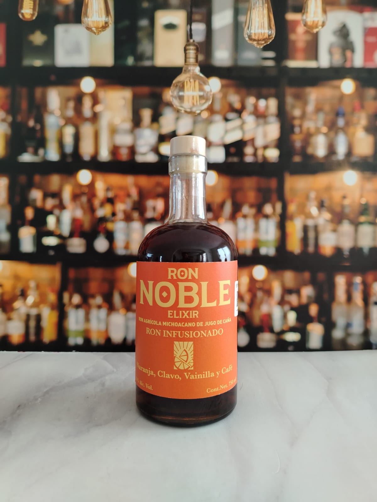 RON NOBLE ELIXIR INFUSIONADO NARANJA , CLAVO, VAINILLA Y CAFÉ 750 ML™
