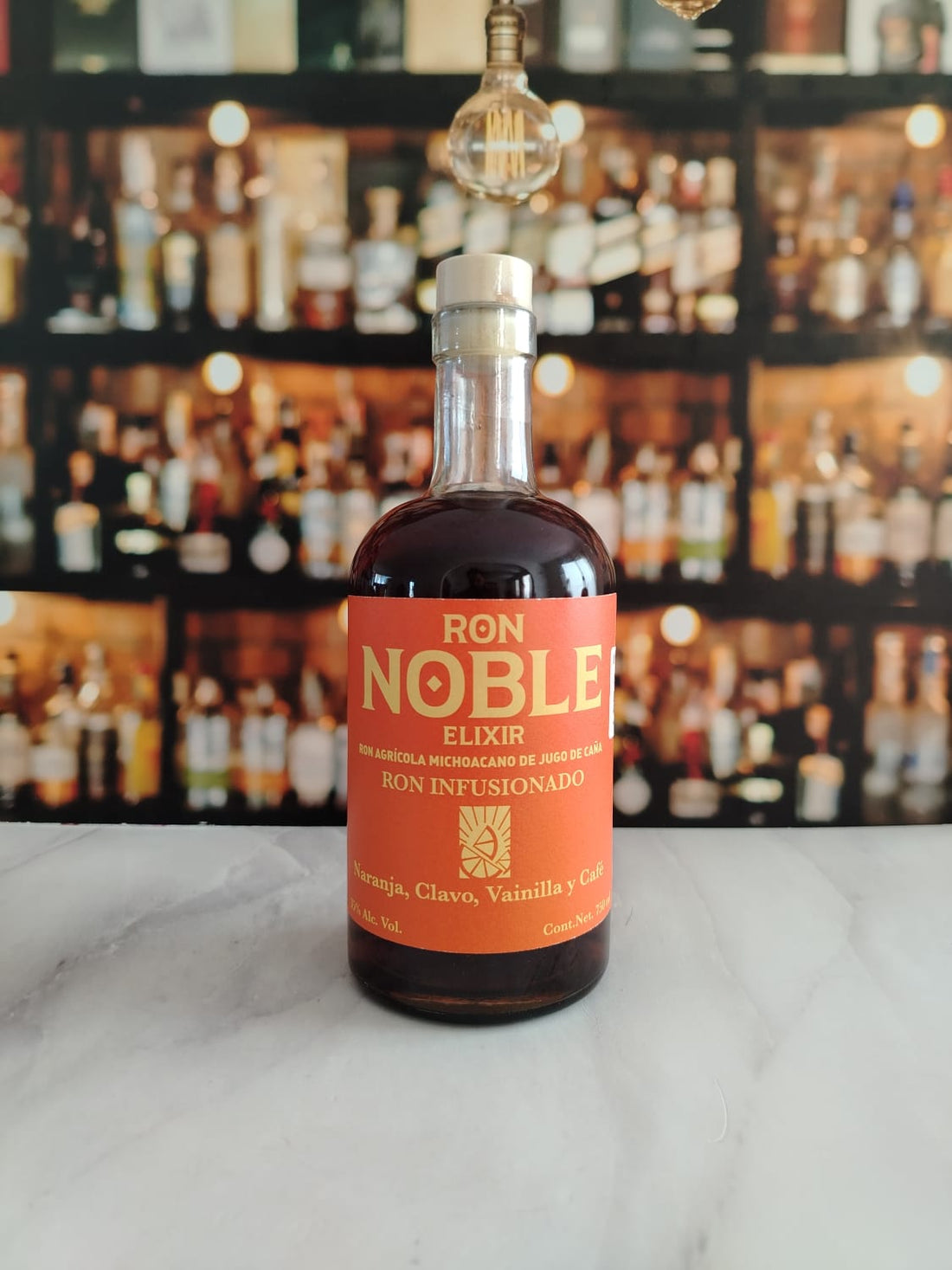 RON NOBLE ELIXIR INFUSIONADO NARANJA , CLAVO, VAINILLA Y CAFÉ 750 ML™